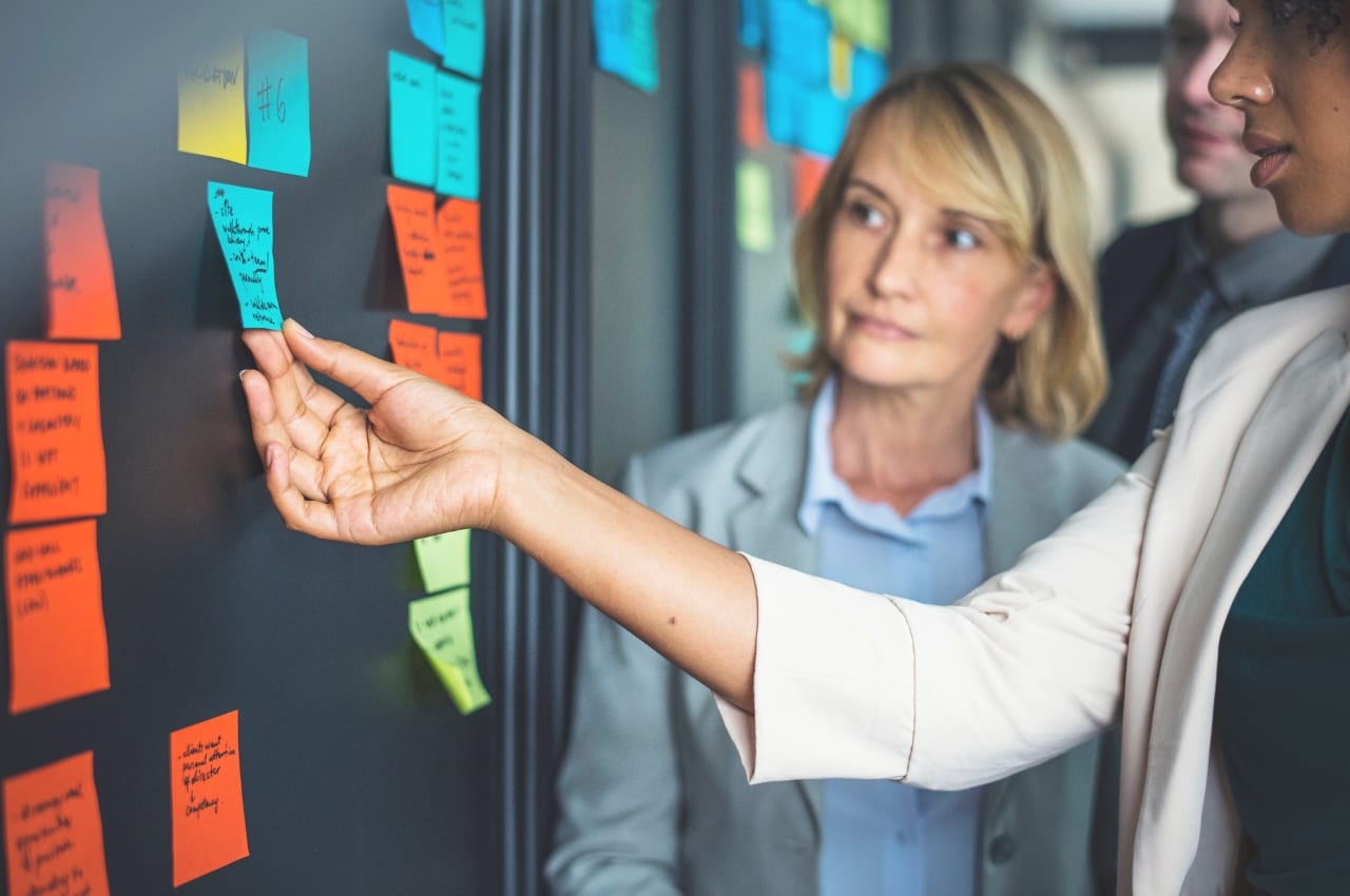 Touching blue sticky note