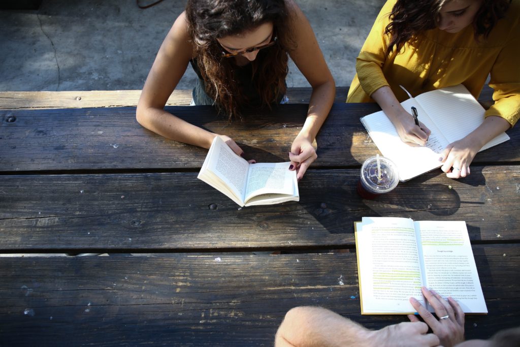 Students studying together outside